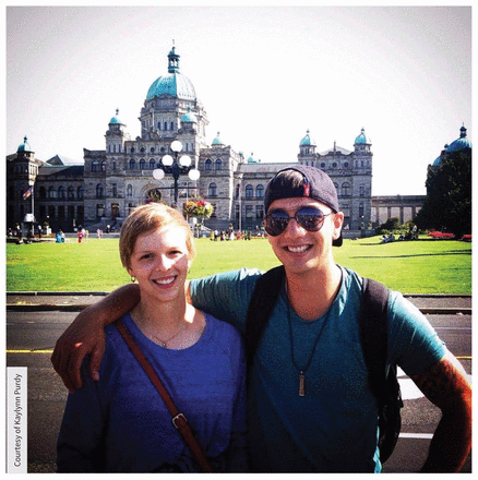 The author stands with her brother in front of the British Columbia Legislature in 2014.